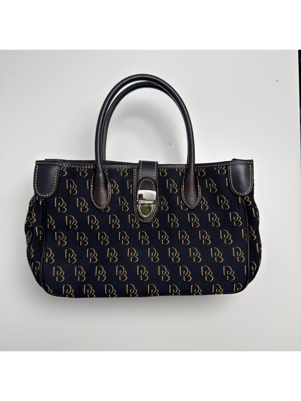 Dooney & Bourke DB Monogram Satchel Purse Black Gold Leather Trim Push Lock